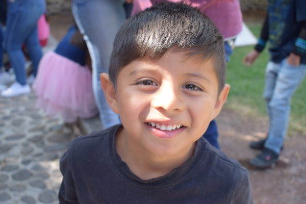 Little boy from Mexico smiling to the camera